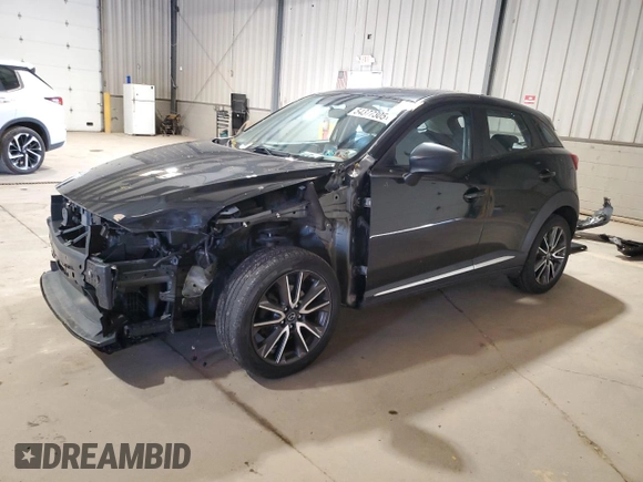 2017 Mazda CX-3 Grand Touring z VIN JM1DKFD71H0141595, wystawiony jako Copart lot #54377305 z przebiegiem 60 907 mil mil oraz Szkody całkowita. Historia ofert i sprzedaży dostępna na DreamBid. Obrazek 1.
