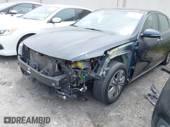 2018 Kia Optima EX with VIN KNAGU4LE6J5020594, listed as a IAAI auction lot 42118299 with 65,482 mi miles and . Bid and sale history available at DreamBid. Image 2.