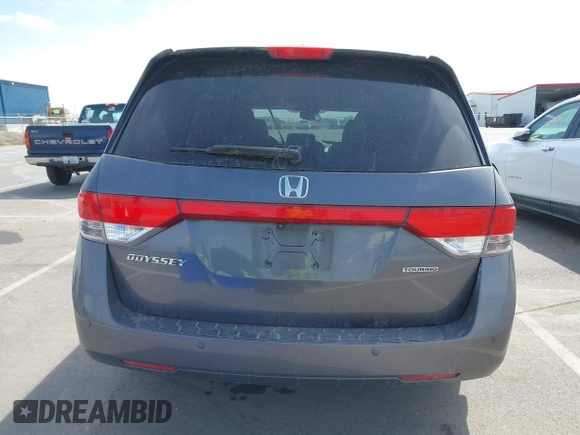 2014 Honda Odyssey Touring with VIN 5FNRL5H91EB093540, listed as a IAAI auction lot 41887412 with 202,076 mi miles and . Bid and sale history available at DreamBid. Image 16.