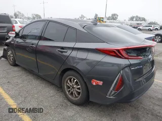 2018 Toyota Prius Plus with VIN JTDKARFP5J3095377, listed as a IAAI auction lot 42153552 with 77,255 mi miles and . Bid and sale history available at DreamBid. Image 3.