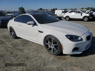 2014 BMW M6 z VIN WBSLX9C51ED160143, wystawiony jako Copart lot #50762185 z przebiegiem 91 718 mil mil oraz Szkody całkowita. Historia ofert i sprzedaży dostępna na DreamBid. Obrazek 4.