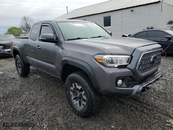 2019 Toyota Tacoma 4WD SR5 with VIN 5TFSZ5AN1KX201678, listed as a Copart auction lot 51586605 with 50,470 mi miles and Salvage Title. Bid and sale history available at carsss.com. Image 4.