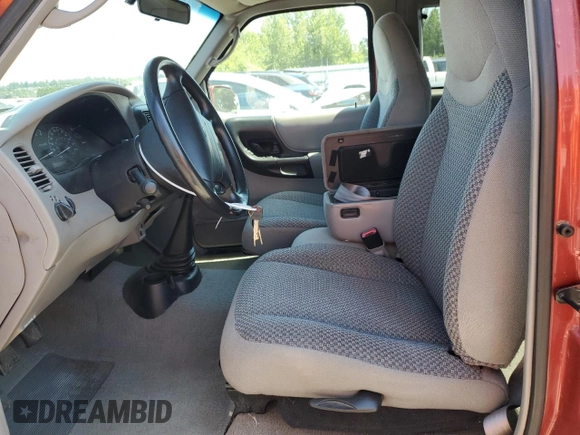 1998 Ford Ranger XL with VIN 1FTZR15U4WPB10502, listed as a Copart auction lot 60064895 with 122,711 mi miles and Clean title. Bid and sale history available at DreamBid. Image 7.