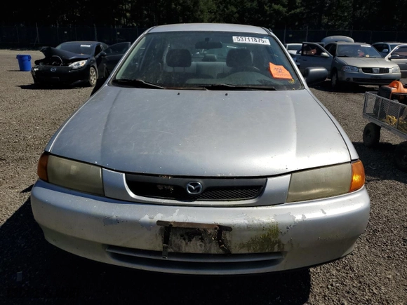 1998 Mazda Protege DX with VIN JM1BC1417W0226912, listed as a Copart auction lot 53711875 with 210,374 mi miles and Clean Title. Bid and sale history available at carsss.com. Image 5.