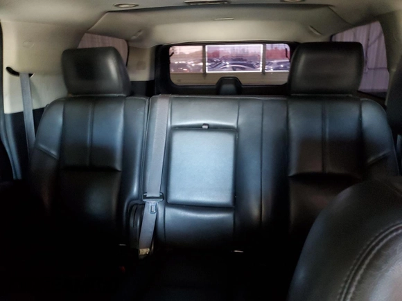 2014 Chevrolet Suburban LT with VIN 1GNSKJE77ER120211, listed as a Copart auction lot 62469424 with 213,282 mi miles and Salvage Title. Bid and sale history available at carsss.com. Image 10.