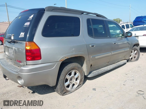 2003 GMC Envoy SLT with VIN 1GKES16S336101568, listed as a IAAI auction lot 40187998 with 185,402 mi miles. Bid and sale history available at carsss.com. Image 4.