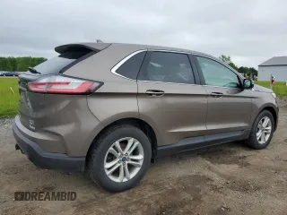 2019 Ford Edge SEL z VIN 2FMPK4J97KBB03622, wystawiony jako Copart lot #58164685 z przebiegiem 95 183 mil mil oraz Czysty tytuł • Clean title. Historia ofert i sprzedaży dostępna na DreamBid. Obrazek 3.