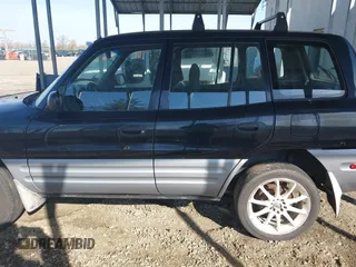 2000 Toyota RAV4 with VIN JT3GP10V5Y7073965, listed as a IAAI auction lot 42013237 with 284,594 mi miles and . Bid and sale history available at DreamBid. Image 14.
