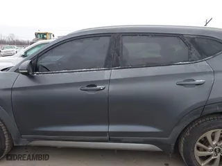 2017 Hyundai Tucson Value with VIN KM8J33A22HU358357, listed as a IAAI auction lot 41583774 with 139,338 mi miles. Bid and sale history available at carsss.com. Image 15.