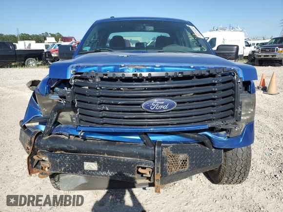 2014 Ford F-150 XL with VIN 1FTFX1EF0EFB59517, listed as a Copart auction lot 52318065 with 203,181 mi miles and Clean title. Bid and sale history available at DreamBid. Image 5.