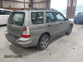 2006 Subaru Forester X with VIN JF1SG63656H700426, listed as a IAAI auction lot 42467619 with 210,918 mi miles and . Bid and sale history available at DreamBid. Image 4.