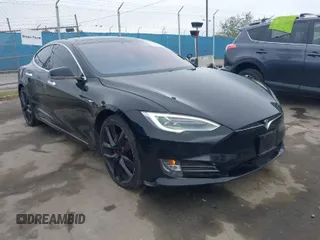 2018 Tesla Model S 75D with VIN 5YJSA1E42JF265691, listed as a IAAI auction lot 41886105 with 99,485 mi miles and . Bid and sale history available at DreamBid. Image 1.