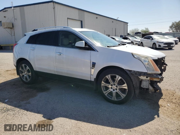 2012 Cadillac SRX Premium Collection with VIN 3GYFNFE34CS517102, listed as a Copart auction lot 60483155 with 111,770 mi miles and Salvage title. Bid and sale history available at DreamBid. Image 4.