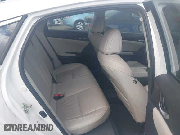 2019 Honda Insight Touring with VIN 19XZE4F91KE007748, listed as a IAAI auction lot 40233174 with 78,036 mi miles and . Bid and sale history available at DreamBid. Image 8.