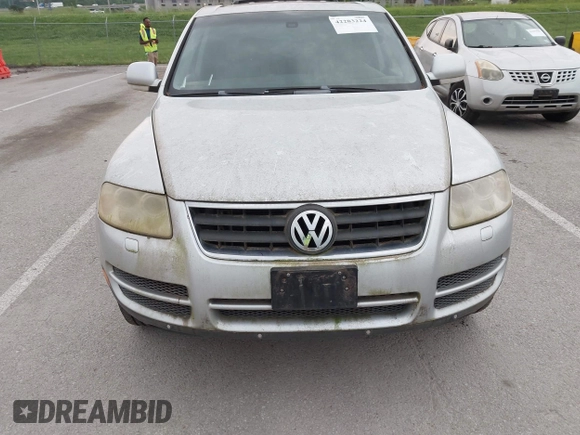 2007 Volkswagen Touareg V6 z VIN WVGZE77L57D001046, wystawiony jako IAAI lot #42283224 z przebiegiem 243 861 mil mil oraz . Historia ofert i sprzedaży dostępna na DreamBid. Obrazek 12.