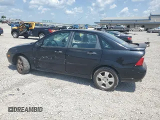 2006 Ford Focus S with VIN 1FAFP34N76W246035, listed as a Copart auction lot 61985015 with 196,498 mi miles and Salvage title. Bid and sale history available at DreamBid. Image 2.