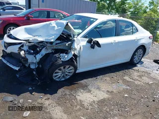 2019 Toyota Camry LE with VIN 4T1B11HK2KU187475, listed as a IAAI auction lot 42192293 with 44,413 mi miles and . Bid and sale history available at DreamBid. Image 19.