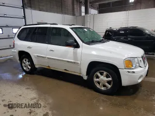2005 GMC Envoy SLE z VIN 1GKDT13S452360609, wystawiony jako Copart lot #56188495 z przebiegiem 180 046 mil mil oraz Szkoda całkowita • Salvage title. Historia ofert i sprzedaży dostępna na DreamBid. Obrazek 4.