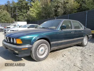 1994 BMW 7 Series z VIN WBAGD432XRDE66323, wystawiony jako Copart lot #44301075 z przebiegiem 64 301 mil mil oraz Nie do naprawy • Non repairable. Historia ofert i sprzedaży dostępna na DreamBid. Obrazek 1.