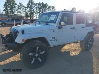 2009 Jeep Wrangler Unlimited X with VIN 1J4GA39149L770474, listed as a IAAI auction lot 41368507 with 188,475 mi miles. Bid and sale history available at carsss.com. Image 17.