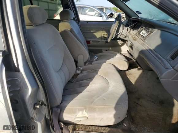 2000 Ford Crown Victoria with VIN 2FAFP73W5YX181565, listed as a Copart auction lot 77098594 with 180,439 mi miles and Salvage Title. Bid and sale history available at carsss.com. Image 7.
