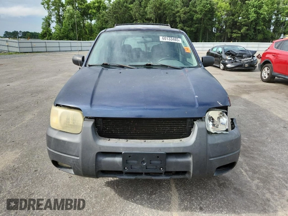 2003 Ford Escape XLT Popular with VIN 1FMCU03123KA03878, listed as a Copart auction lot 60133485 with 298,100 mi miles and Salvage title. Bid and sale history available at DreamBid. Image 5.