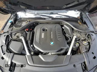 2019 BMW 7 Series 740i xDrive z VIN WBA7E4C50KGV28241, wystawiony jako Copart lot #87329774 z przebiegiem Nie podano mil oraz Szkoda całkowita • Salvage title. Historia ofert i sprzedaży dostępna na DreamBid. Obrazek 11.