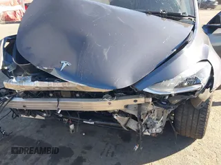 2020 Tesla Model Y Long Range with VIN 5YJYGDEE0LF041762, listed as a IAAI auction lot 40556913 with Not Provided miles and . Bid and sale history available at DreamBid. Image 6.