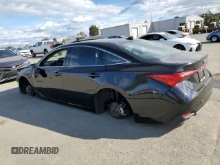 2021 Toyota Avalon Limited Hybrid z VIN 4T1DA1AB7MU001032, wystawiony jako Copart lot #48187545 z przebiegiem 73 676 mil mil oraz Szkoda całkowita • Salvage title. Historia ofert i sprzedaży dostępna na DreamBid. Obrazek 2.