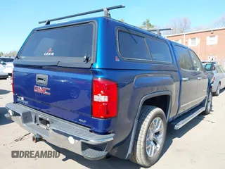 2015 GMC Sierra 1500 SLT with VIN 3GTU2VEC5FG377584, listed as a IAAI auction lot 41957928 with 91,125 mi miles and . Bid and sale history available at DreamBid. Image 4.