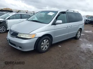 2003 Honda Odyssey EX-L z VIN 5FNRL18033B096575, wystawiony jako IAAI lot #41576926 z przebiegiem 210 932 mil mil oraz . Historia ofert i sprzedaży dostępna na DreamBid. Obrazek 2.