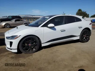 2019 Jaguar I-Pace SE z VIN SADHC2S19K1F68022, wystawiony jako Copart lot #77405114 z przebiegiem Nie podano mil oraz Szkody całkowita. Historia ofert i sprzedaży dostępna na DreamBid. Obrazek 1.