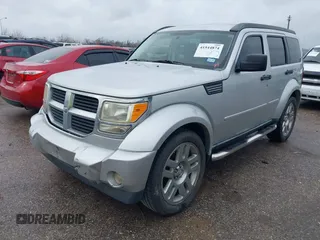 2008 Dodge Nitro SLT with VIN 1D8GT58K58W127412, listed as a IAAI auction lot 41544874 with 232,748 mi miles. Bid and sale history available at carsss.com. Image 2.