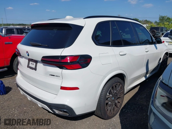 2024 BMW X5 xDrive40i with VIN 5UX23EU04R9S36715, listed as a IAAI auction lot 40168432 with 18,076 mi miles. Bid and sale history available at carsss.com. Image 4.