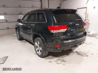 2014 Jeep Grand Cherokee Overland with VIN 1C4RJFCGXEC162109, listed as a IAAI auction lot 41943979 with 147,788 mi miles. Bid and sale history available at carsss.com. Image 3.