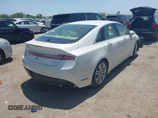 2013 Lincoln MKZ z VIN 3LN6L2G90DR824857, wystawiony jako IAAI lot #42229016 z przebiegiem Nie podano mil oraz . Historia ofert i sprzedaży dostępna na DreamBid. Obrazek 4.