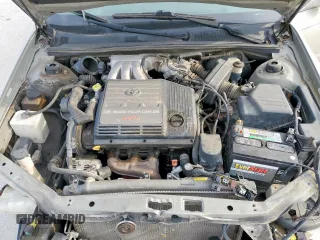 2002 Toyota Avalon XL z VIN 4T1BF28B22U200555, wystawiony jako Copart lot #54544265 z przebiegiem 146 031 mil mil oraz Tytuł czysty. Historia ofert i sprzedaży dostępna na DreamBid. Obrazek 11.