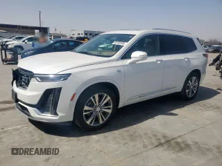 2023 Cadillac XT6 Premium Luxury with VIN 1GYKPERSXPZ194395, listed as a Copart auction lot 48765195 with 22,685 mi miles and Clean Title. Bid and sale history available at DreamBid. Image 1.