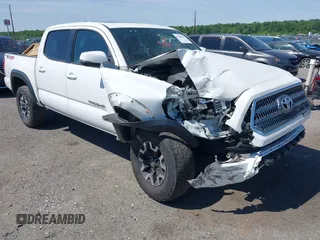 2016 Toyota Tacoma SR with VIN 3TMCZ5AN0GM003224, listed as a IAAI auction lot 42289910 with 140,899 mi miles and . Bid and sale history available at DreamBid. Image 1.