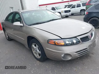 2001 Pontiac Bonneville SE z VIN 1G2HX54K714211864, wystawiony jako IAAI lot #41390183 z przebiegiem 221 551 mil mil oraz . Historia ofert i sprzedaży dostępna na DreamBid. Obrazek 1.