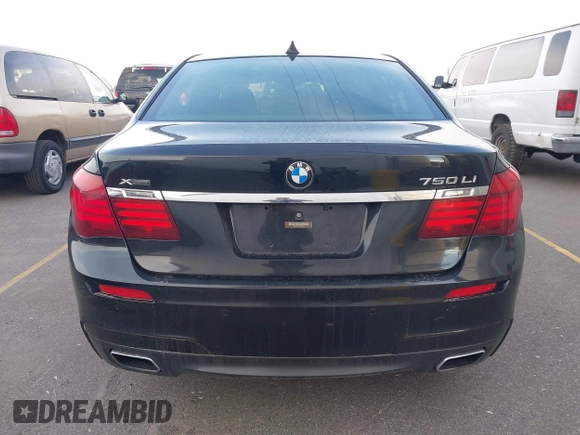 2015 BMW 7 Series 750Li xDrive with VIN WBAYF8C55FD654949, listed as a IAAI auction lot 41659763 with 91,837 mi miles and . Bid and sale history available at carsss.com. Image 16.