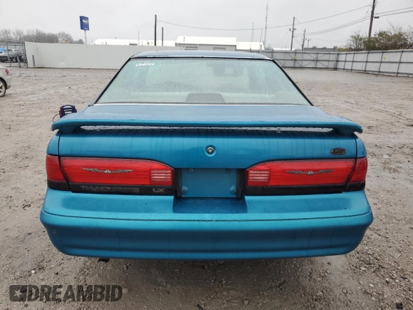 1994 Ford Thunderbird LX with VIN 1FALP6243RH223519, listed as a Copart auction lot 80962814 with 125,016 mi miles and Salvage Title. Bid and sale history available at DreamBid. Image 6.