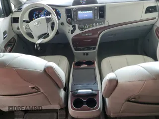 2012 Toyota Sienna XLE с VIN 5TDDK3DC8CS042919, выставлен на аукционе Copart как лот 62644385 с пробегом 135 252 миль миль и Списание • Salvage title. История ставок и продаж доступна на DreamBid. Изображение 8.