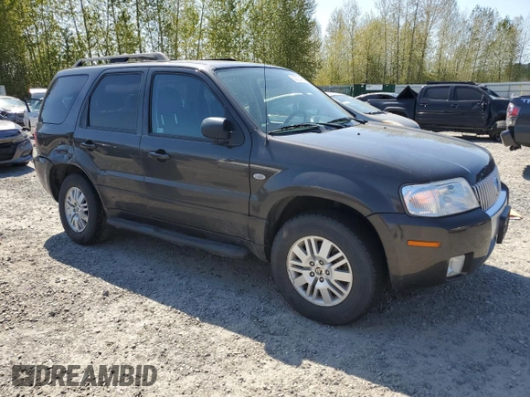 2005 Mercury Mariner Luxury z VIN 4M2CU57135DJ21208, wystawiony jako Copart lot #53555425 z przebiegiem 95 409 mil mil oraz Szkody całkowita. Historia ofert i sprzedaży dostępna na DreamBid. Obrazek 4.