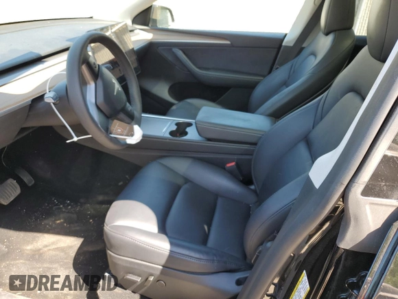 2024 Tesla Model Y z VIN 7SAYGDEDXRF991226, wystawiony jako Copart lot #62090255 z przebiegiem 42 853 mil mil oraz Szkoda całkowita • Salvage title. Historia ofert i sprzedaży dostępna na DreamBid. Obrazek 7.