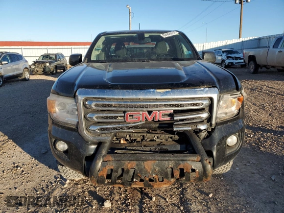 2015 GMC Canyon 4WD SLE with VIN 1GTH6BE37F1133213, listed as a Copart auction lot 82404014 with 142,149 mi miles and Salvage Title. Bid and sale history available at carsss.com. Image 5.
