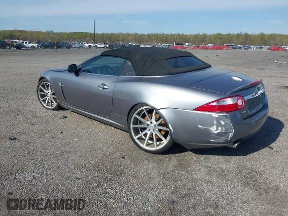 2007 Jaguar XK with VIN SAJWA44B075B11143, listed as a IAAI auction lot 42044257 with 122,842 mi miles. Bid and sale history available at carsss.com. Image 3.