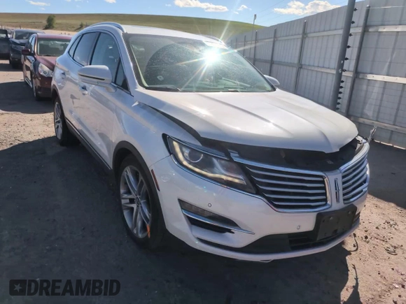 2015 Lincoln MKC z VIN 5LMTJ2AH7FUJ26375, wystawiony jako Copart lot #57830425 z przebiegiem 96 169 mil mil oraz Szkoda całkowita • Salvage title. Historia ofert i sprzedaży dostępna na DreamBid. Obrazek 14.