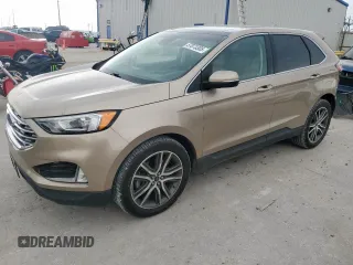 2020 Ford Edge Titanium with VIN 2FMPK4K94LBA08483, listed as a Copart auction lot 57073305 with 70,567 mi miles and Salvage title. Bid and sale history available at DreamBid. Image 1.