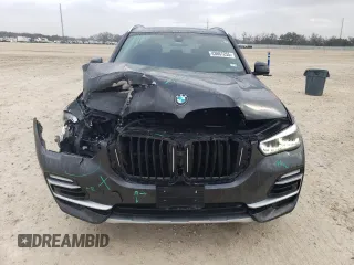 2021 BMW X5 sDrive40i with VIN 5UXCR4C09M9F79014, listed as a Copart auction lot 43667255 with 54,431 mi miles and Salvage Title. Bid and sale history available at carsss.com. Image 5.